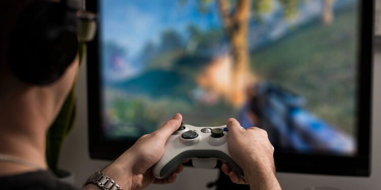 Os jogos eletrônicos estão em alta entre adultos e crianças - depositphotos.com / REDPIXEL