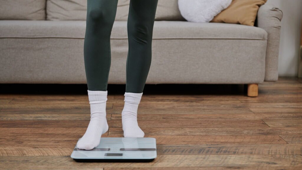 Tentando engravidar e não consegue? O problema pode estar na balança