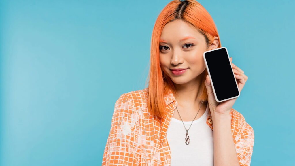 Por que as camisas femininas têm botões do lado esquerdo?