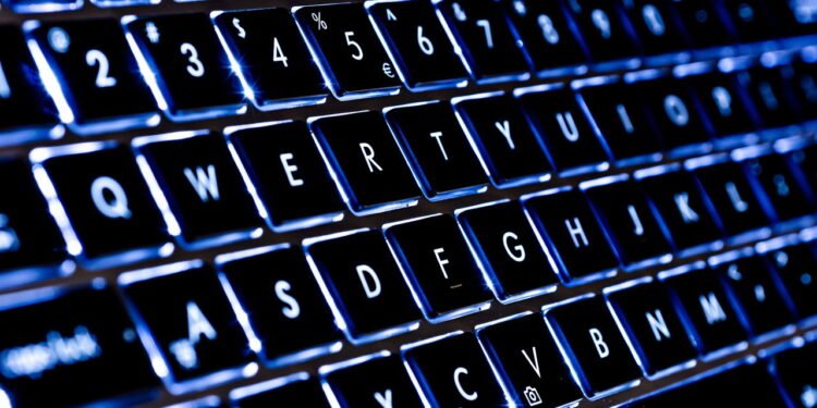 Por que só as teclas F e J têm um traço em alto-relevo no teclado?