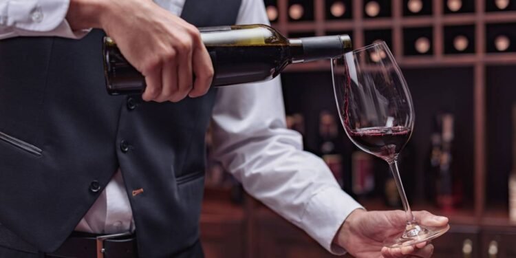 Para que serve o entalhe no na base das garrafas de vinho