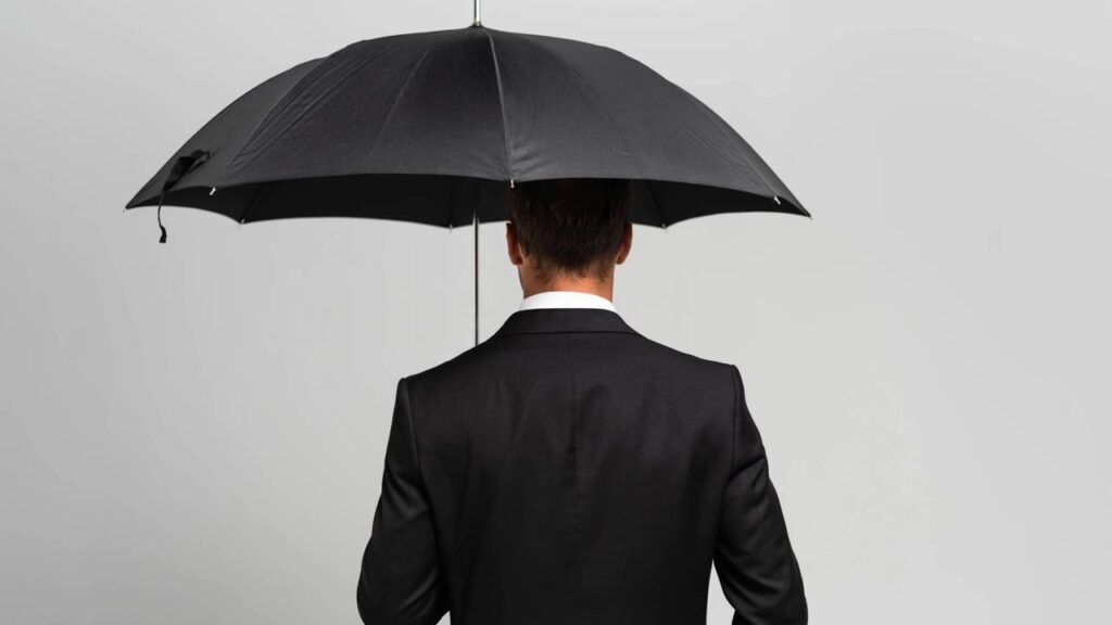 Qual a função da ponta de metal no guarda-chuva?