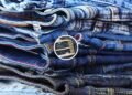 Poucos sabem para que servem os botões de metal na calça jeans