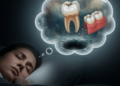 O que significa sonhar com dente caindo, segundo a psicologia