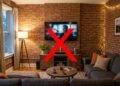Nem isolamento de lã de rocha, nem paredes de tijolo maciço, a tecnologia de placas cimentícias perfuradas que elimina o eco em salas de TV residenciais sem gastar fortunas com reformas estruturais