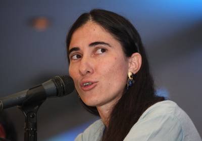 (FILE) Cuban dissident, blogger Yoani Sanchez, speaks during a press conference at the Inter American Press Association meeting in Puebla, Mexico on March 10, 2013.  Sanchez announced this Thursday that her digital newspaper "14ymedio" will be launched on May 21 in Cuba.  AFP PHOTO/JOSE CASTANARES