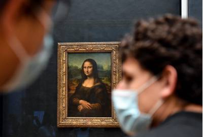 A obra-prima do artista italiano Leonardo da Vinci, também conhecida como Mona Lisa, exibida no Museu do Louvre -  (crédito: ALAIN JOCARD)